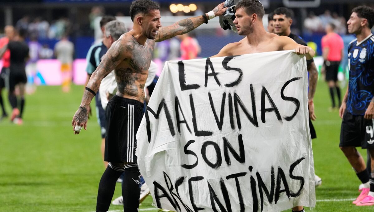 Argentina players brandish political Falklands flag after England match