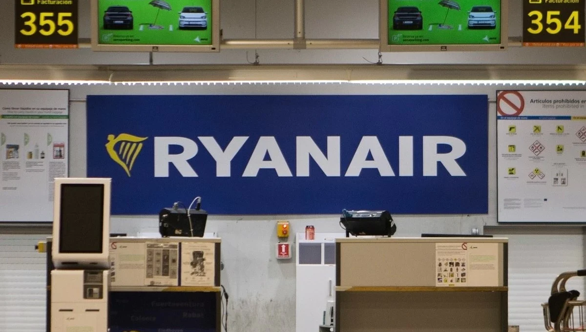 Fellow passengers pull back man partly sucked out of broken window on flight from Greece