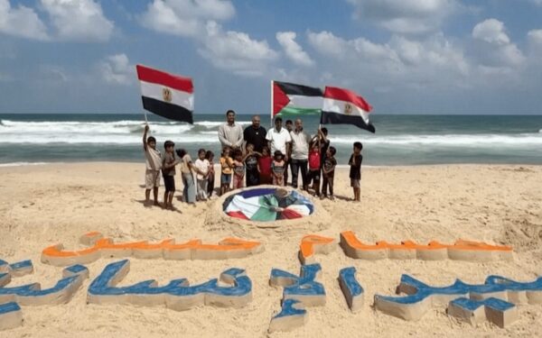Gaza artists honour Egypt coach Hossam Hassan with sand portrait