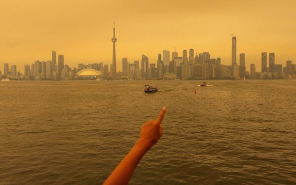 Toronto engulfed by wildfire smoke as US cities threatened