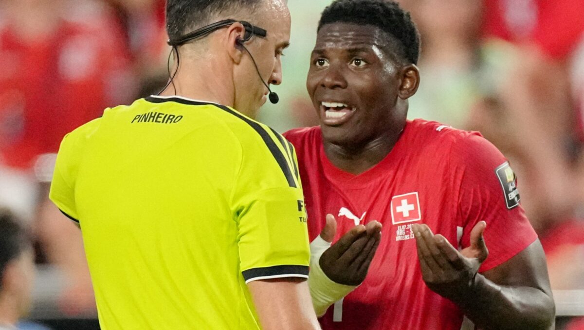 What was the mistaken identity red card shown in Argentina vs Switzerland?