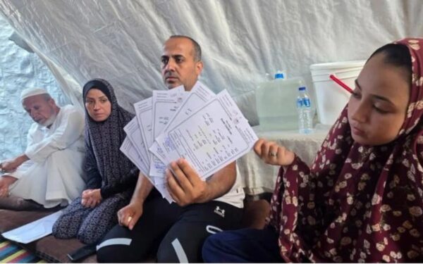 After three years apart, a Gaza father returns to his wife – and six death certificates