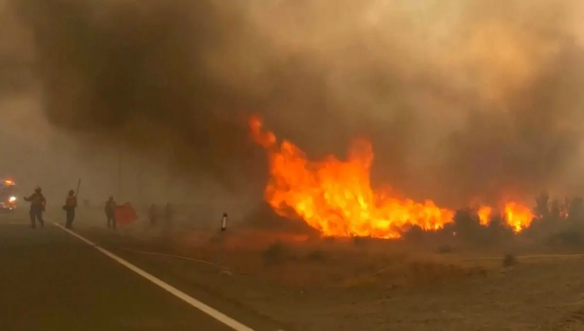 Firefighters make progress against Nevada wildfire that's destroyed more than 30 homes