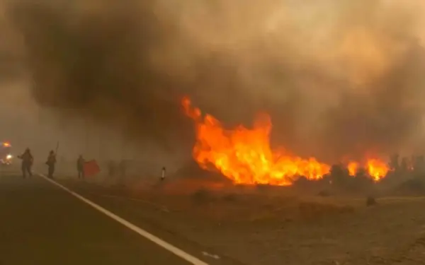 Firefighters make progress against Nevada wildfire that's destroyed more than 30 homes